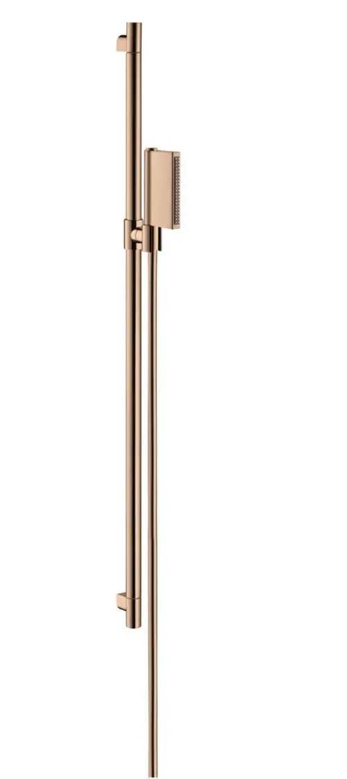 Verticales Duscheset in Polished Red Gold-Finish von AXOR, bestehend aus einer Handbrause und einem Halter, montiert an einer geraden Stange.